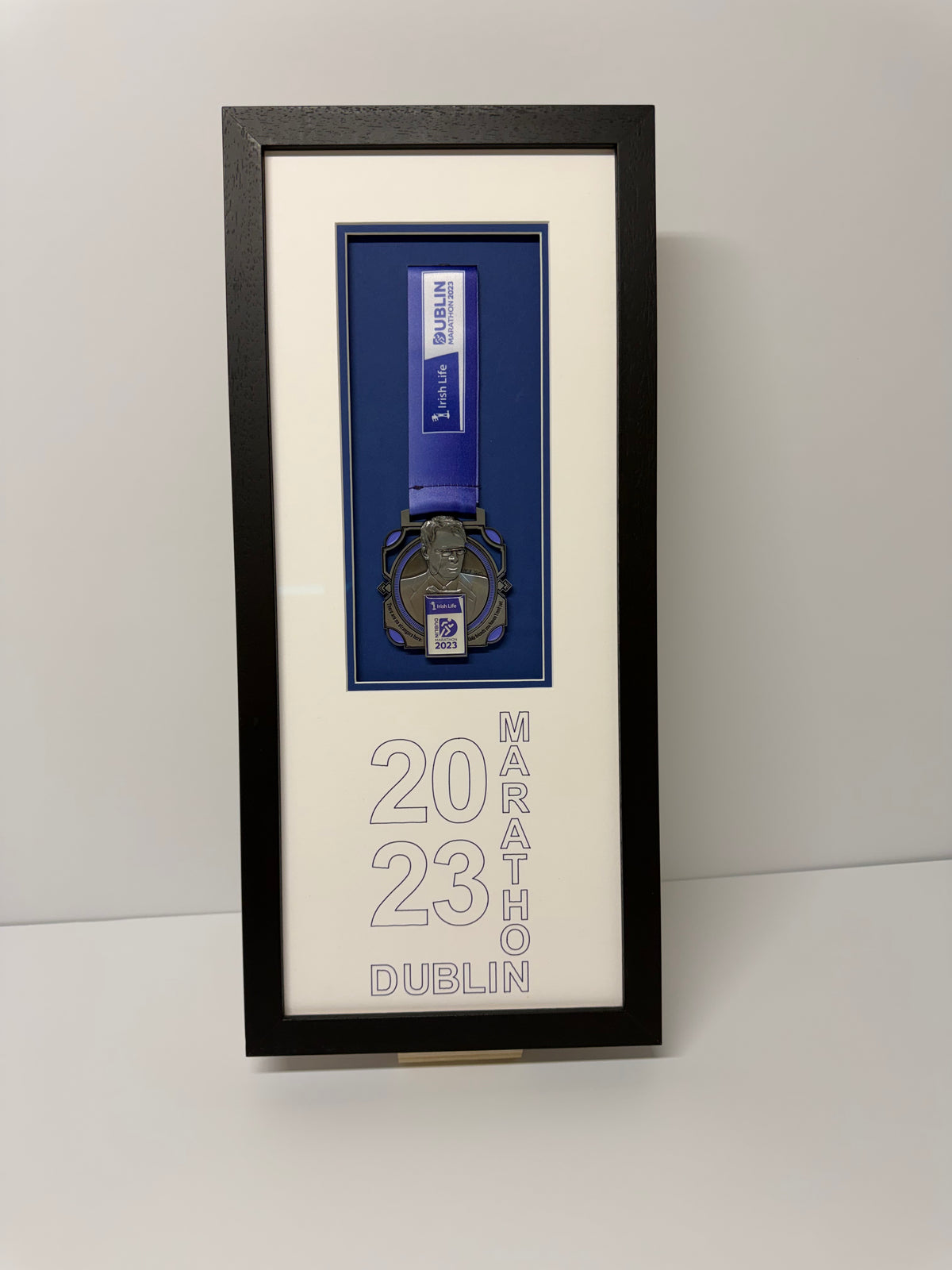 Dublin Marathon medal frame with medal, ribbon and lettering on the mount