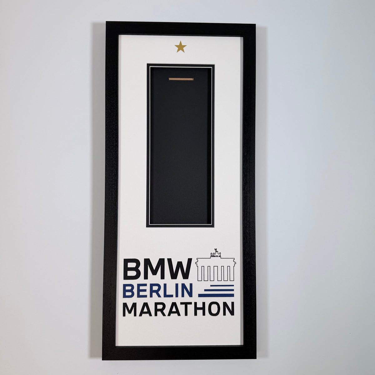 Berlin Marathon medal frame with medal, ribbon and lettering on the mount