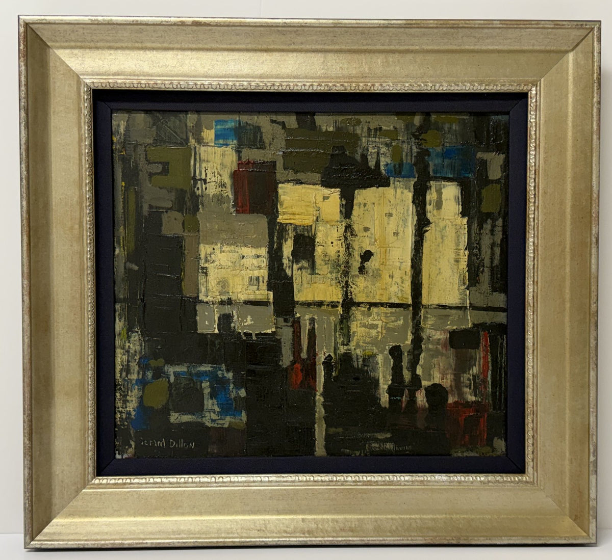 Abstract oil painting in dark greys, yellows and blues in a champagne-gold frame with a blue linen liner.